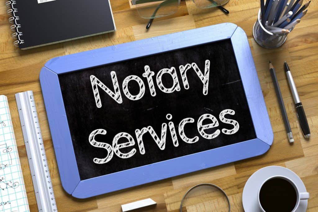 tablet with the word notary services