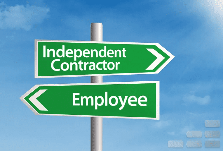 road signs showing independent contractor one way and employee the other way