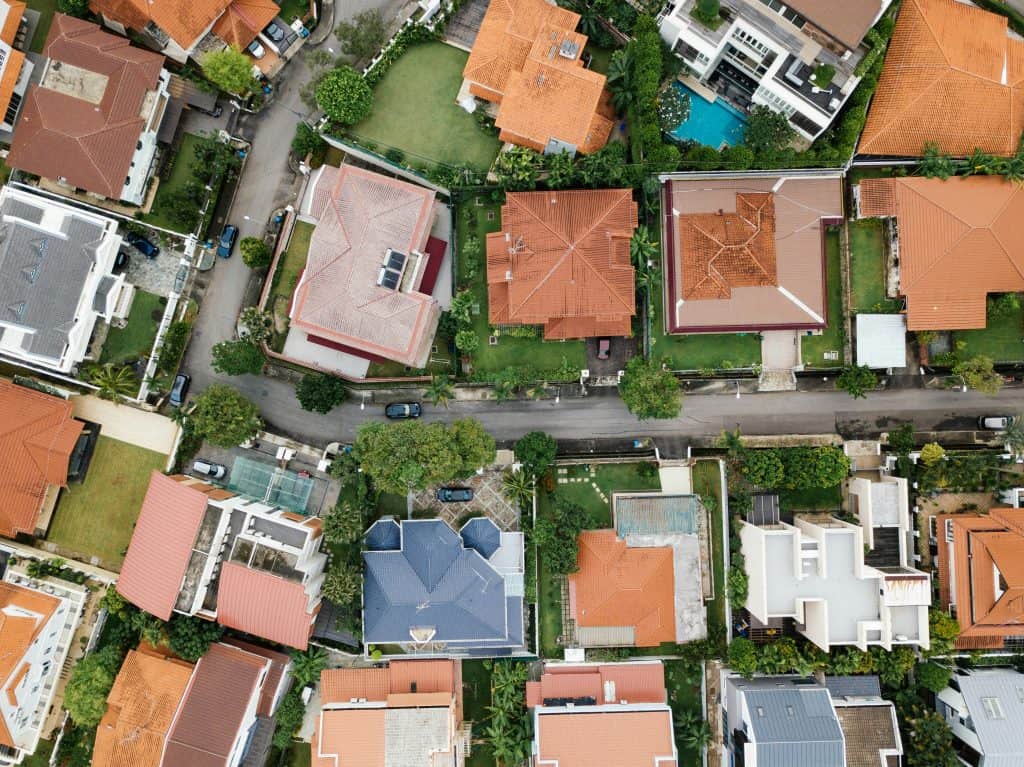 Aerial view of a cityscape during daytime, illustrating the landscape of real estate development​