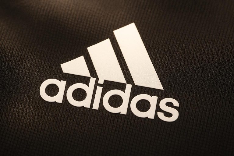 What is the meaning behind the Adidas logo