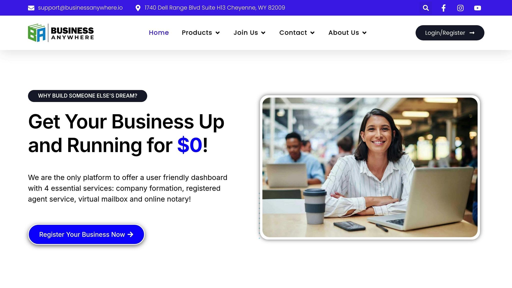 A smiling woman working on a laptop in a modern office environment, representing business growth and online entrepreneurship.