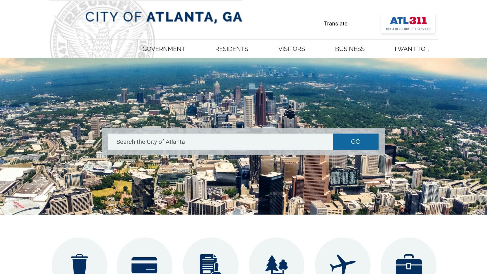 Aerial view of Atlanta's skyline with a search bar overlay for city information and services.