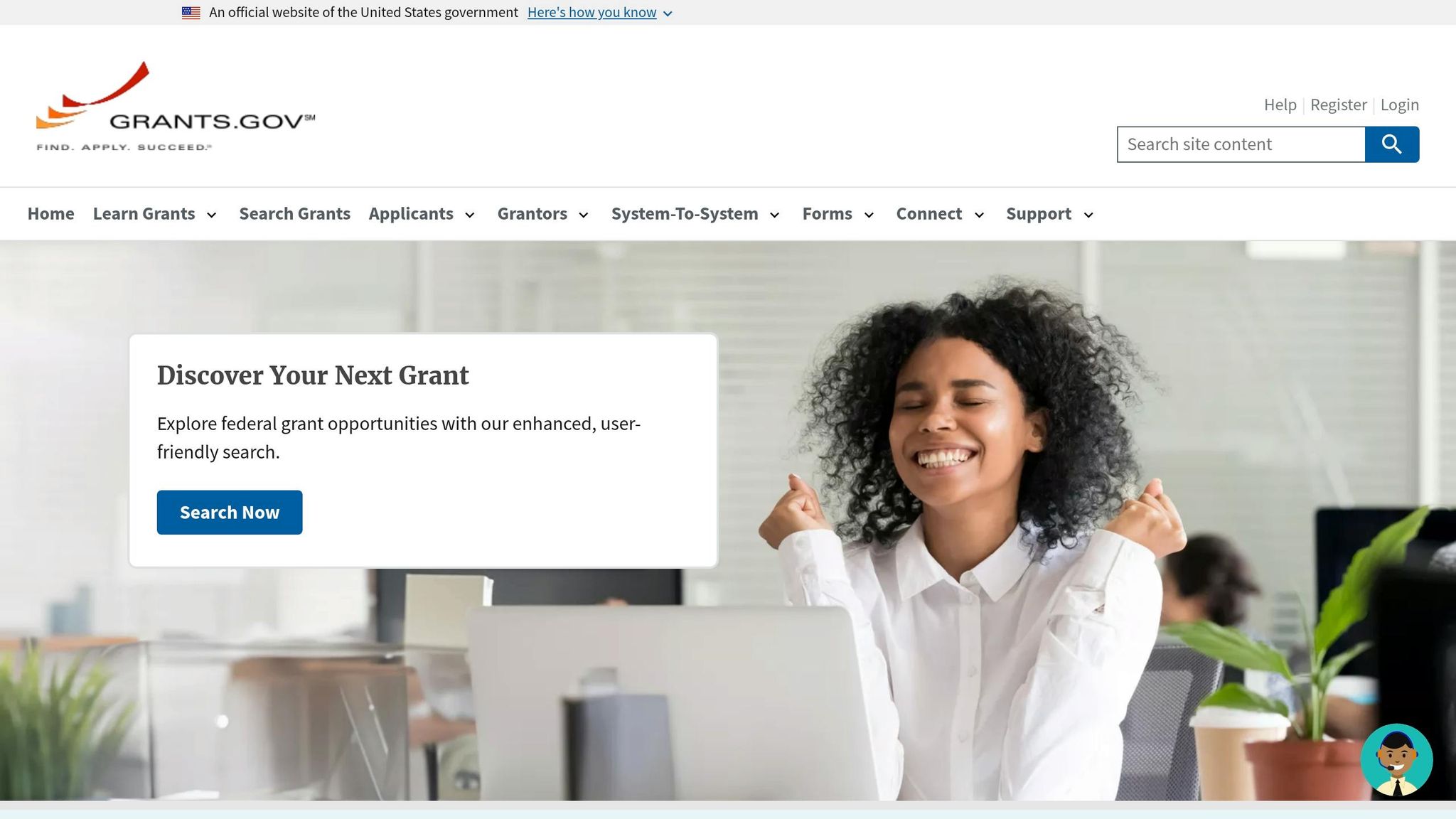 Happy woman celebrating success with a laptop, representing finding grants for small businesses and startups.