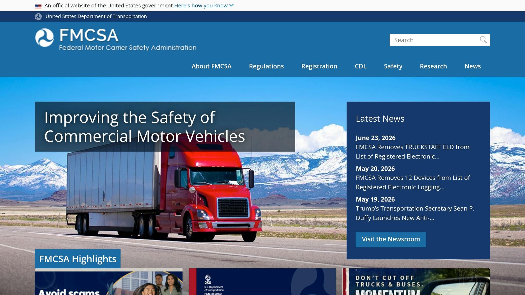 FMCSA website promoting safety for commercial motor vehicles with a red truck on a highway and mountains in the background.