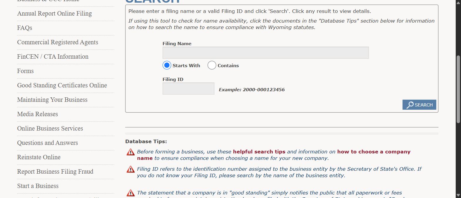 Wyoming Secretary of State business entity search form with the Starts With and Contains options, the Filing ID field and the Database Tips section below