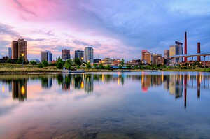 Birmingham, Alabama skyline reflected in a lake at sunset