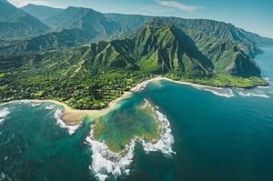 Aerial view of the green Kauai coastline in Hawaii