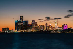 Detroit, Michigan skyline across the river at sunset