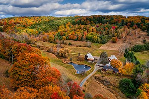 Vermont farm and hills in peak fall color